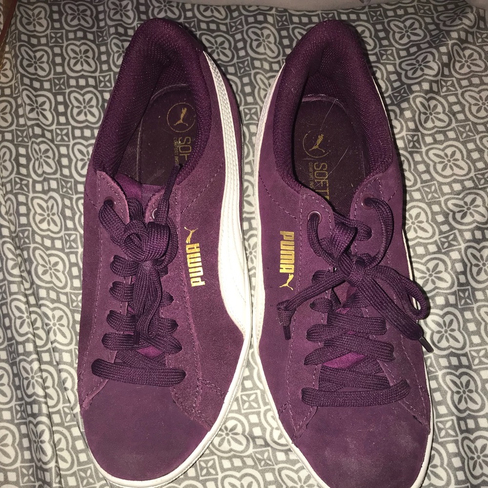 Purple suede pumas